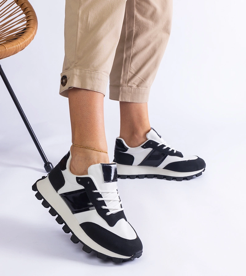 Čierne tenisky s viditeľným protektorom Restia