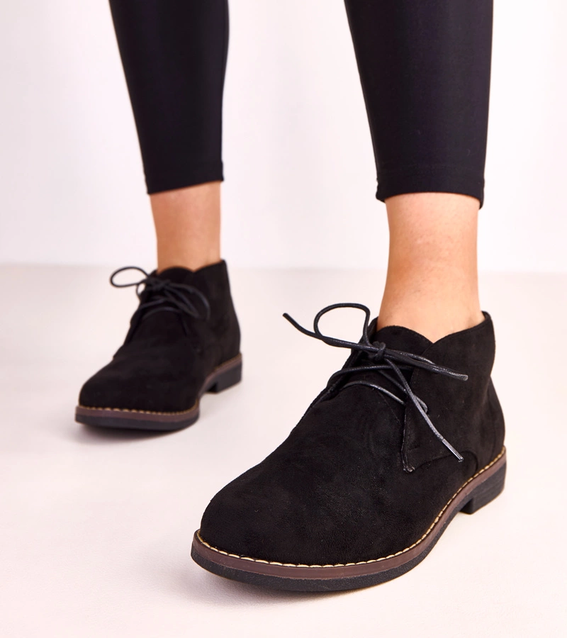 Čierne dámske členkové topánky na plochej podrážke Lauda