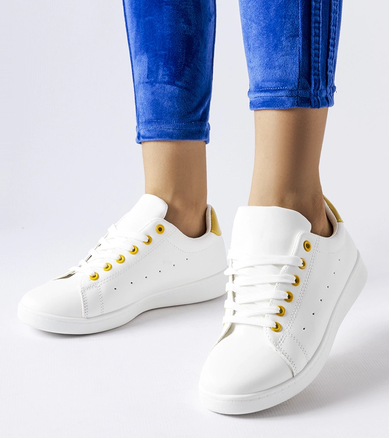 Biele tenisky so žltými akcentmi Bushnell