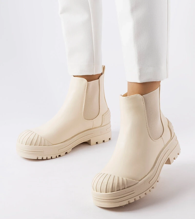 Béžové vrecká s gumovými vložkami Lange