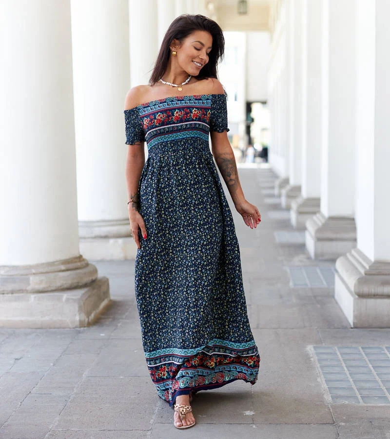 Tmavomodré vzorované šaty značky Iadanza