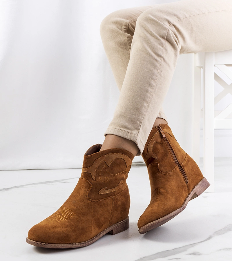 Hnedé kovbojky Velha